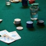 a table with poker chips and cards