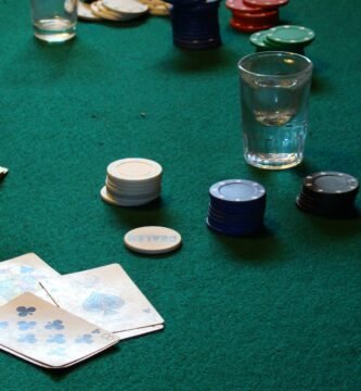 a table with poker chips and cards