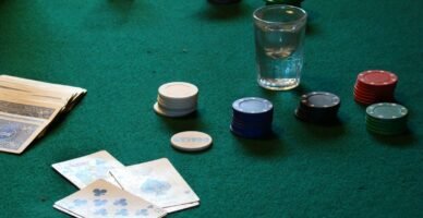 a table with poker chips and cards